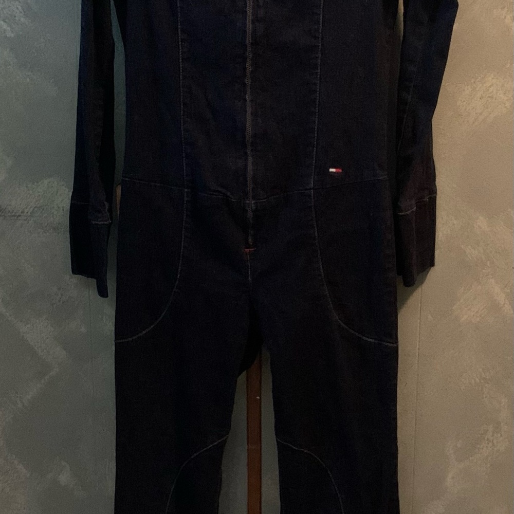 Tommy Hilfiger stretch Jean jumpsuit. Front zip with zipper on the cuffs.